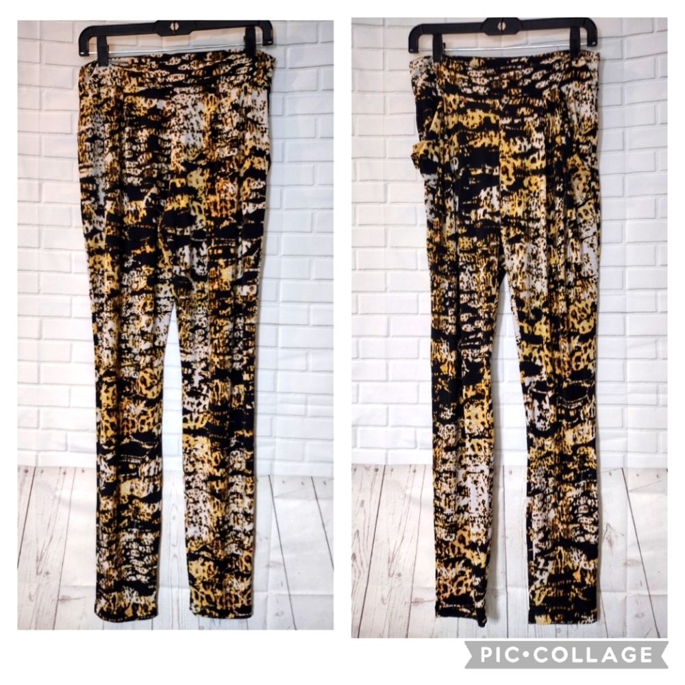 Bebe Black and Orange Cheetah Leopard Like Patterned Pants